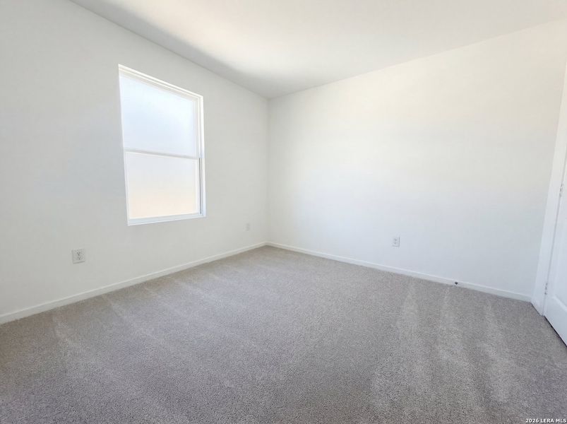 Spacious, unfurnished interior of a new home in Hunters Ranch, San Antonio (Image 14).