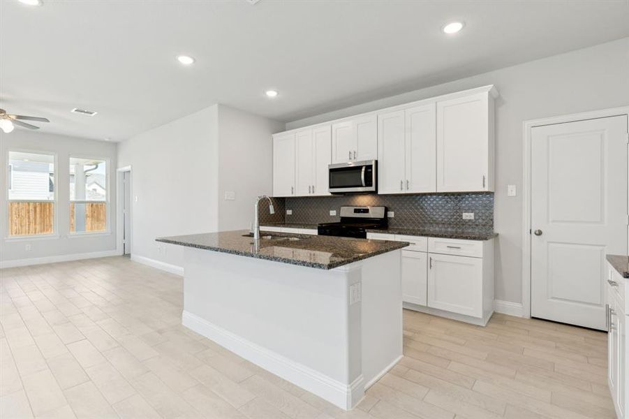 Furnished interior view inside a new home in Venetian, Weston (Image 14).