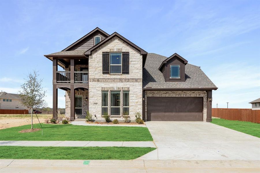 Front exterior of a new home in Glenwood Meadows, Argyle, TX, highlighting curb appeal (Image 1). Front exterior of a new home in Glenwood Meadows, Argyle, TX, highlighting curb appeal (Image 1).