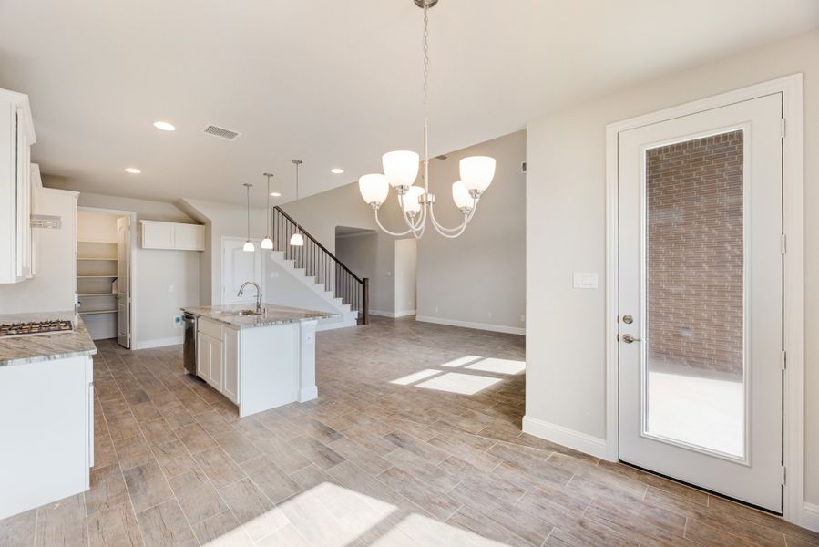 Representative furnished interior of a home built from the Nueces by UnionMain Homes in Lake Breeze, Lavon (Image 11).