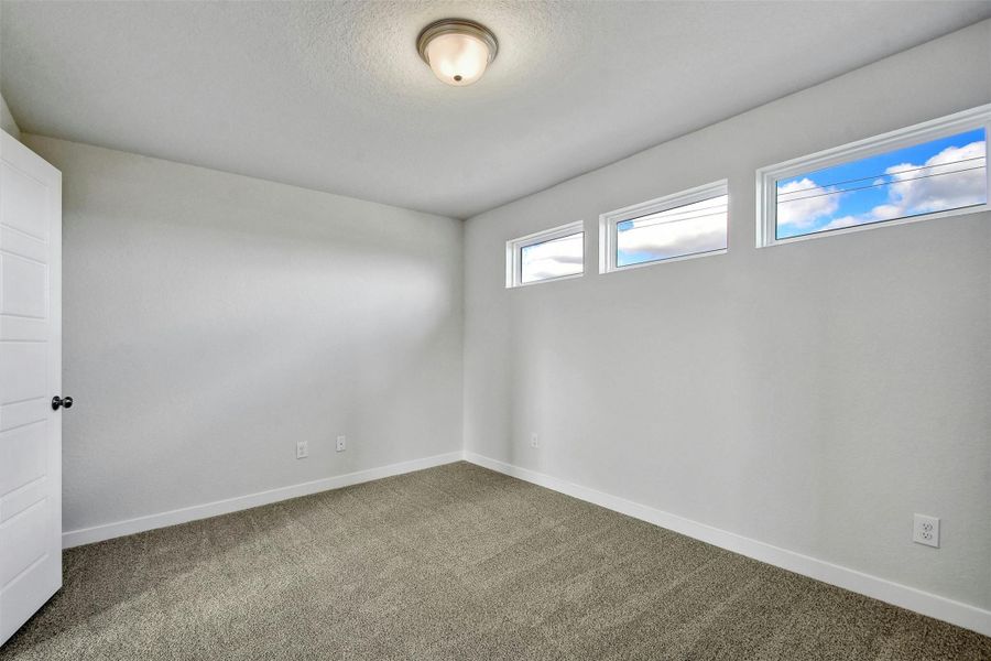 Empty room featuring carpet