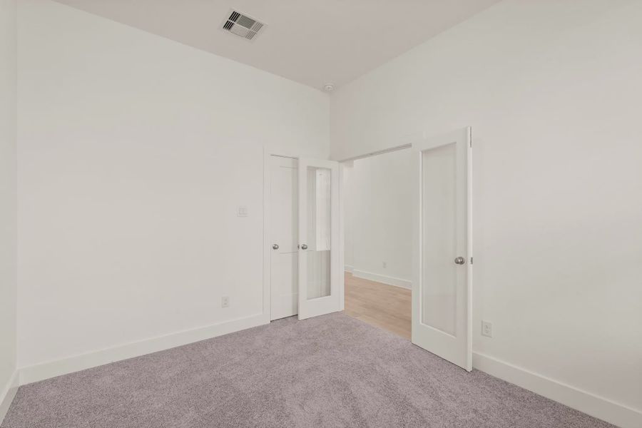 Representative unfurnished interior of a home built from the St Andrews by Chesmar Homes in Riceland Alley Loads, Mont Belvieu (Image 54).