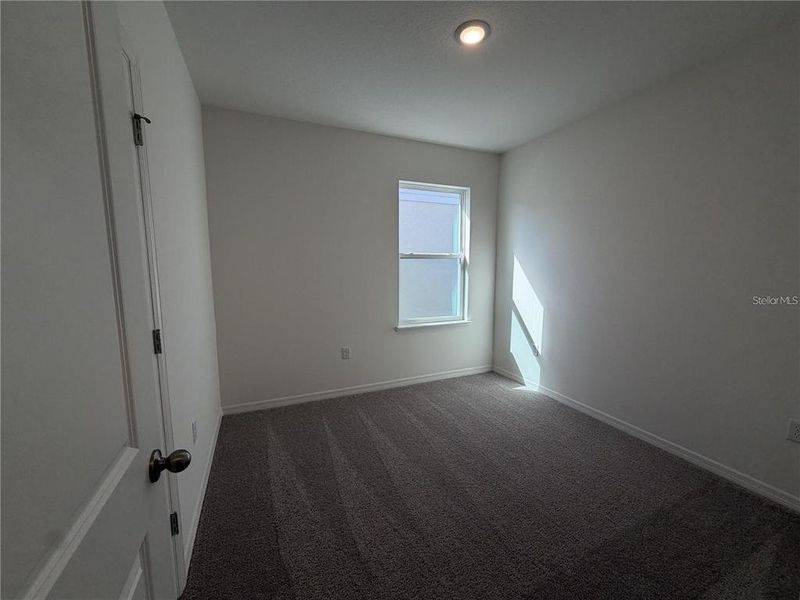 Spacious, unfurnished interior of a new home in Hammock Reserve, Haines City (Image 9).