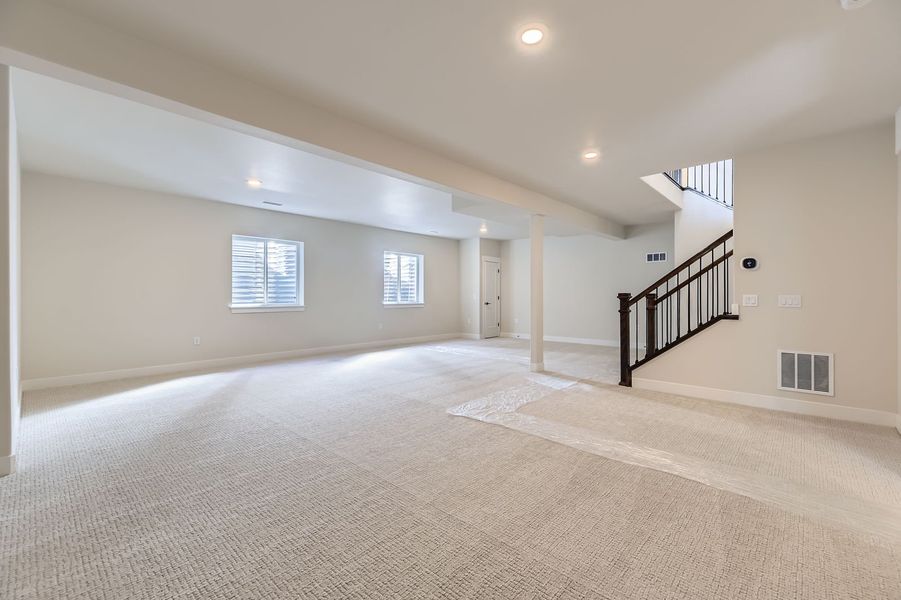 Plan C454 Finished Basement Representative Photo