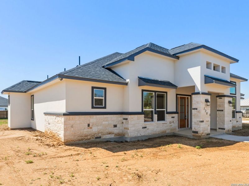 Exterior details and patio area of a home in , Lytle (Image 22).