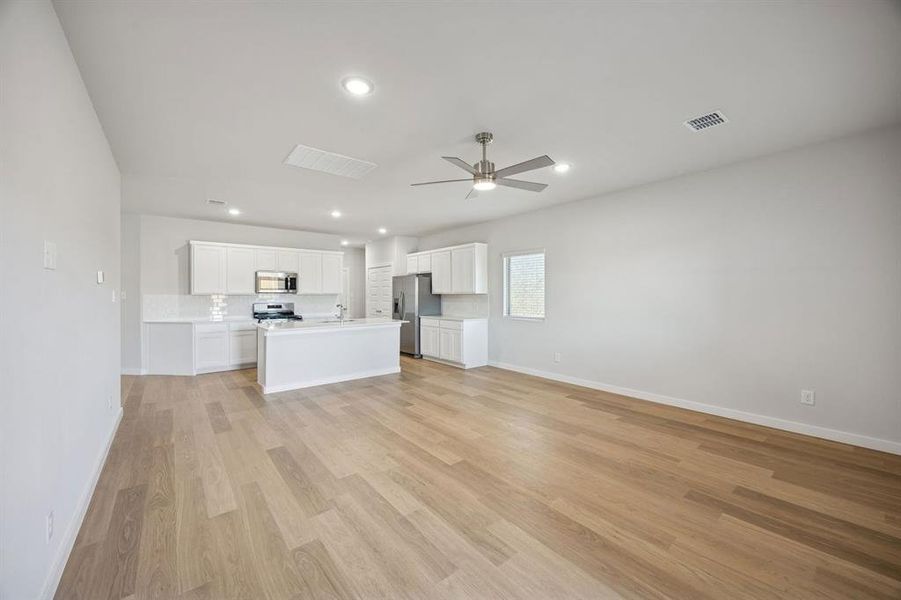 Living Room in the Oak II home plan by Trophy Signature Homes – REPRESENTATIVE PHOTO Living Room in the Oak II home plan by Trophy Signature Homes – REPRESENTATIVE PHOTO