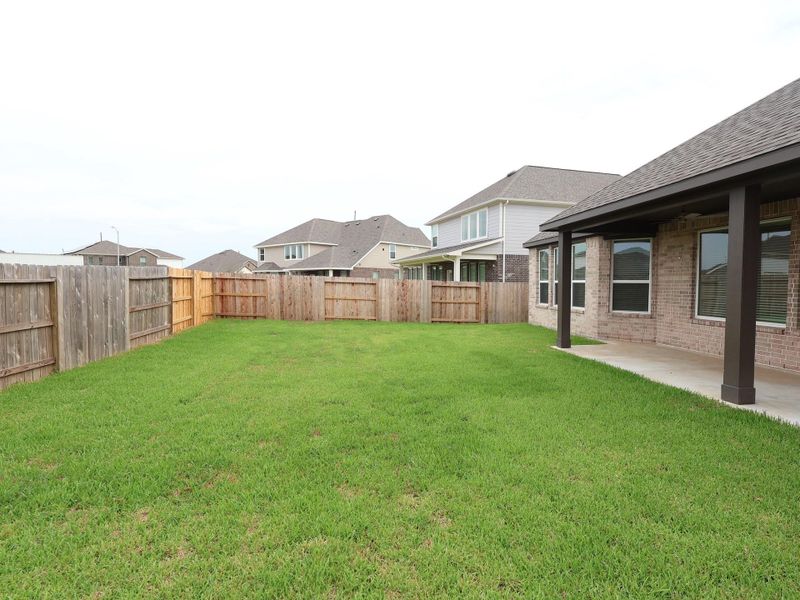 Front exterior of a new home in Marvida, Cypress, TX, highlighting curb appeal (Image 2).