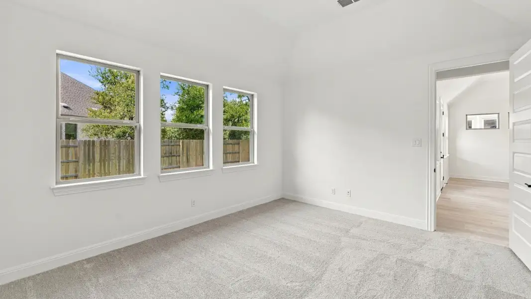 Furnished interior view inside a new home in Oaks at San Gabriel, Georgetown (Image 17).