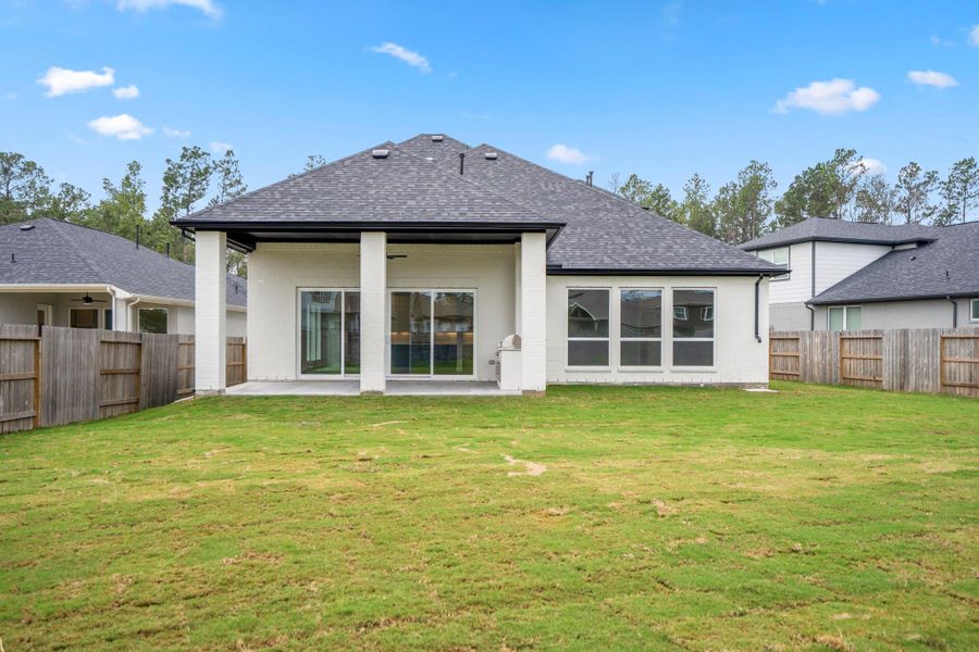 Exterior details and patio area of a home in Artavia, Conroe (Image 29). Exterior details and patio area of a home in Artavia, Conroe (Image 29).