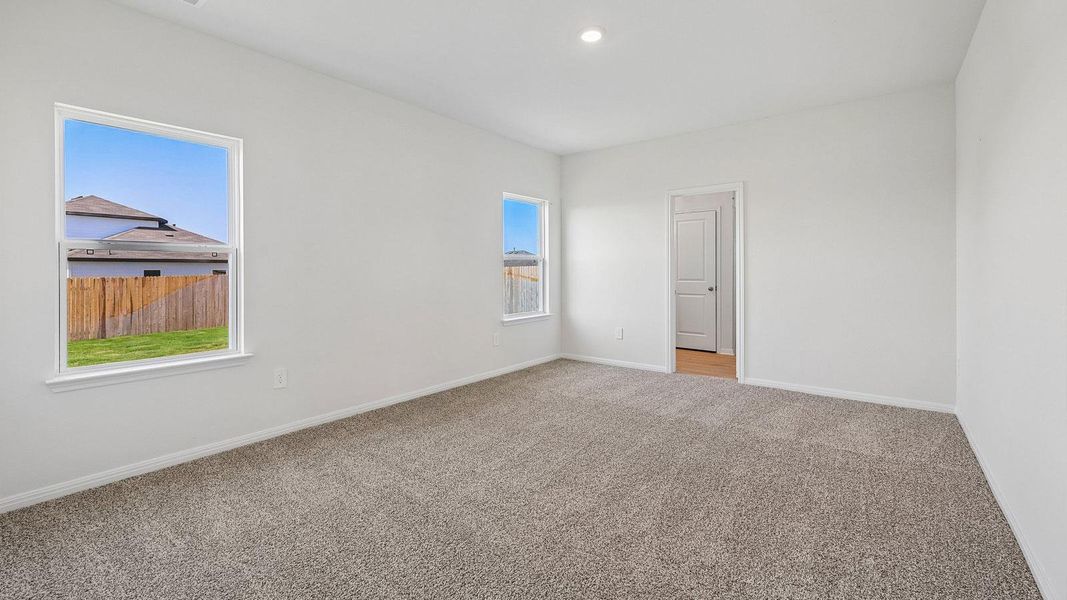 Spacious, unfurnished interior of a new home in Carillon, Manor (Image 21).