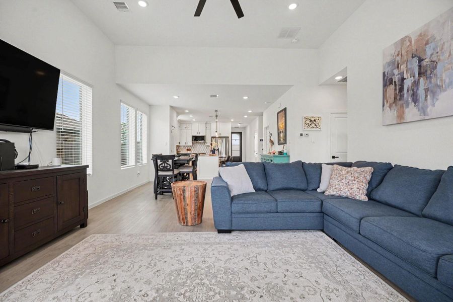 Living area offers plenty of space for seating arrangements while maintaining an open flow to the kitchen and dining areas. Living area offers plenty of space for seating arrangements while maintaining an open flow to the kitchen and dining areas.