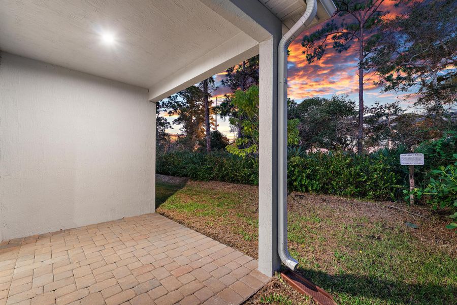 Exterior details and patio area of a home in Banyan Bay, Stuart (Image 48).