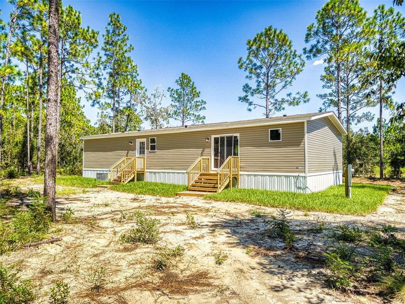 Exterior details and patio area of a home in , Williston (Image 24). Exterior details and patio area of a home in , Williston (Image 24).