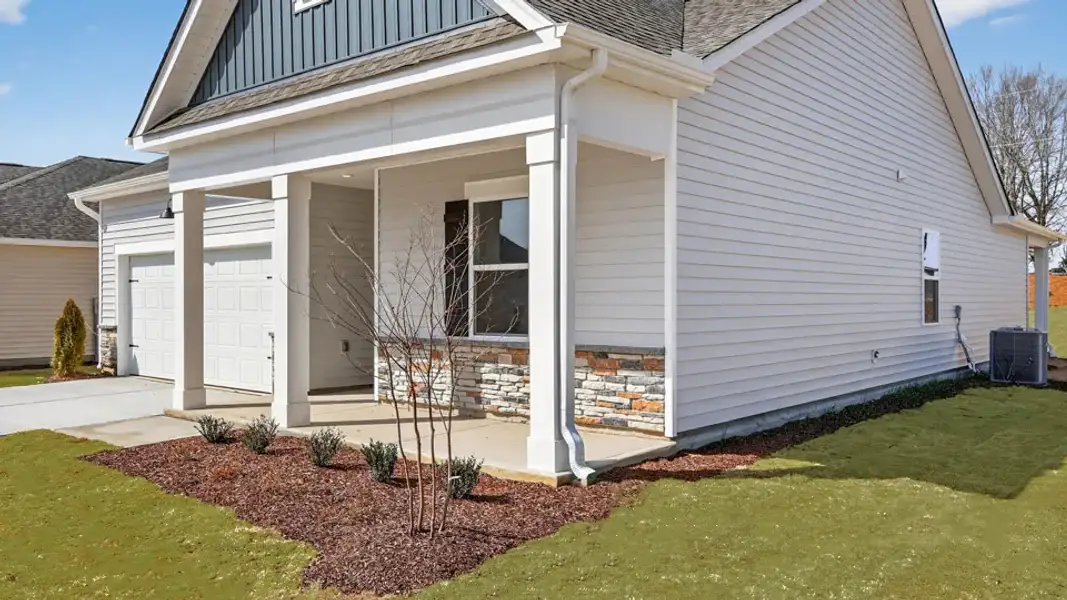 Exterior details and patio area of a home in Honeycutt Oaks, Angier (Image 3).