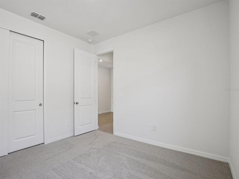 Spacious, unfurnished interior of a new home in Coasterra - Reserve Series, Palmetto (Image 25).