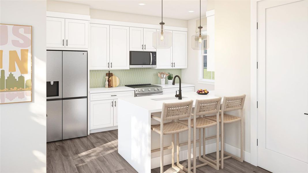 Kitchen with stainless steel appliances, a kitchen breakfast bar, white cabinetry, and recessed lighting