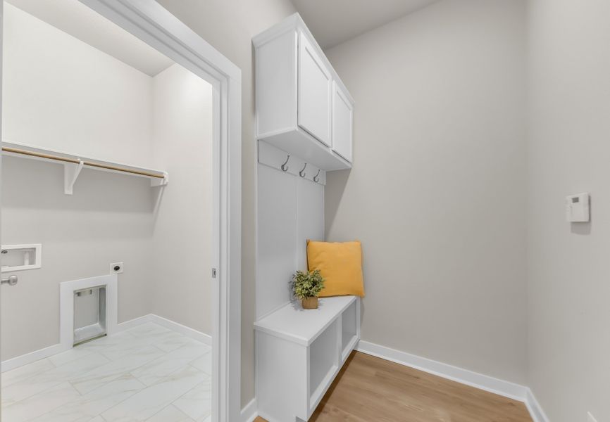 Representative furnished interior of a home built from the The Poppy by Avonley Homes in Rudder Pointe, Bryan (Image 11).