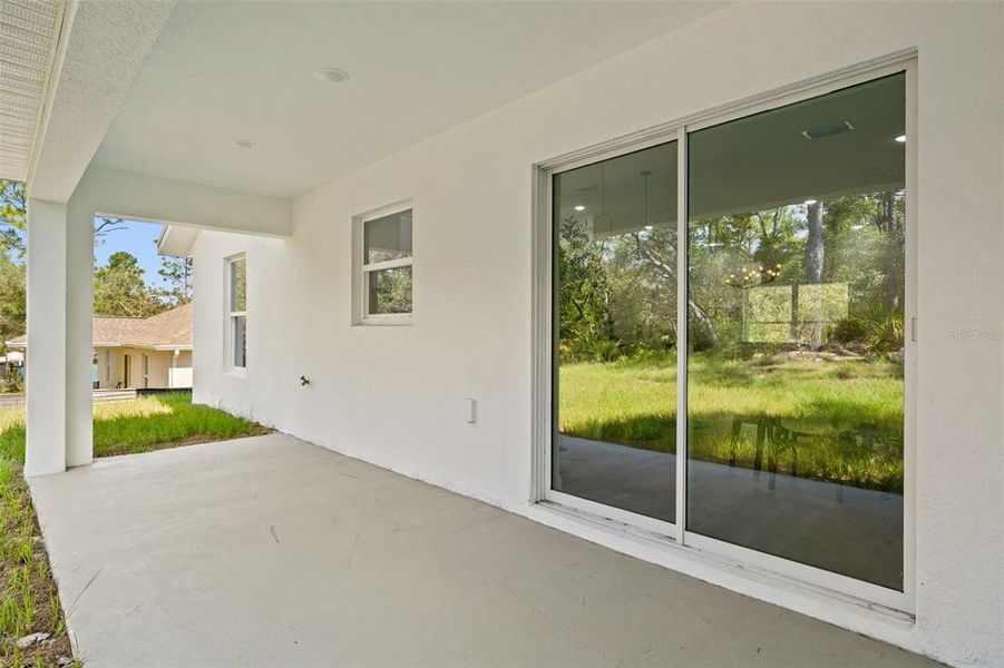 Exterior details and patio area of a home in , Citrus Springs (Image 30).
