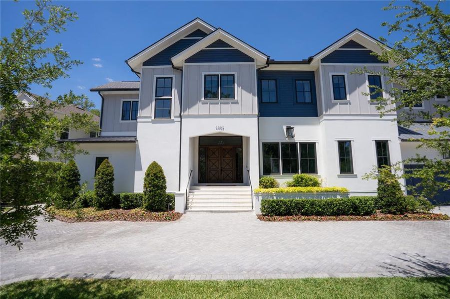 Front exterior of a new home in , Tampa, FL, highlighting curb appeal (Image 26).