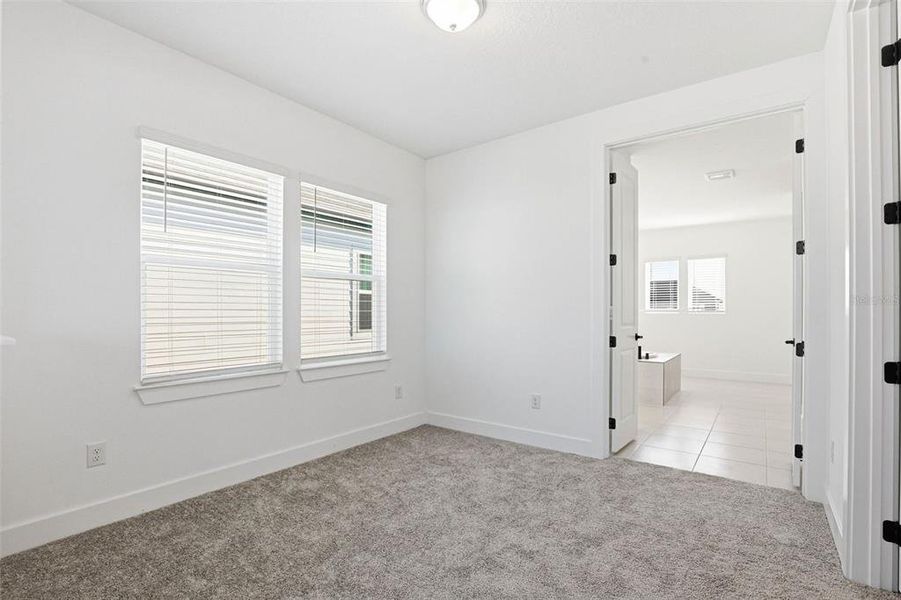 Spacious, unfurnished interior of a new home in Vida's Way, Wesley Chapel (Image 66).