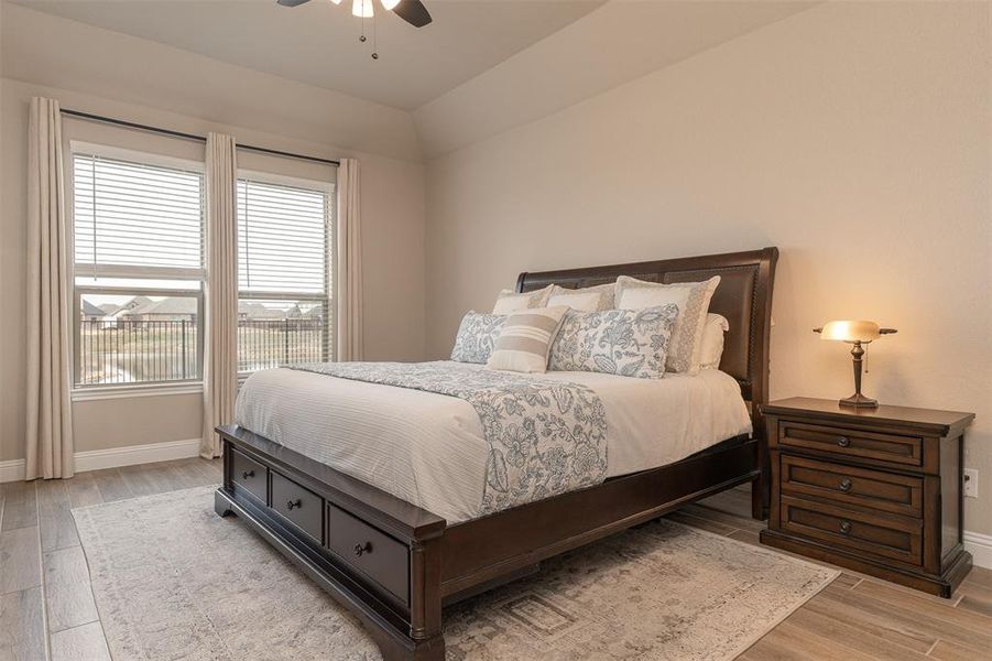 Primary Bathroom with sitting area with custom drapes