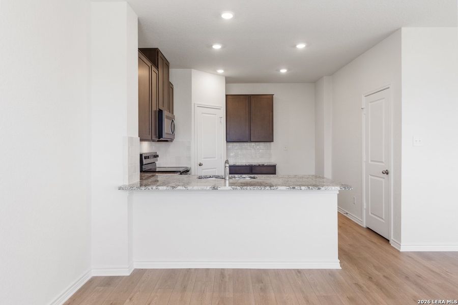 Furnished interior view inside a new home in Knox Ridge, Converse (Image 11).