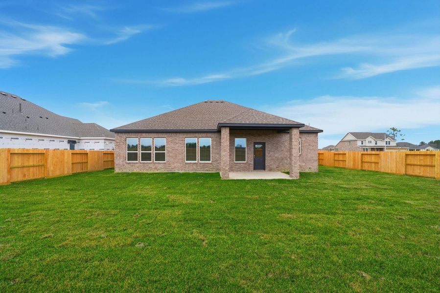 Exterior details and patio area of a home in Woodshore, Clute (Image 3). Exterior details and patio area of a home in Woodshore, Clute (Image 3).
