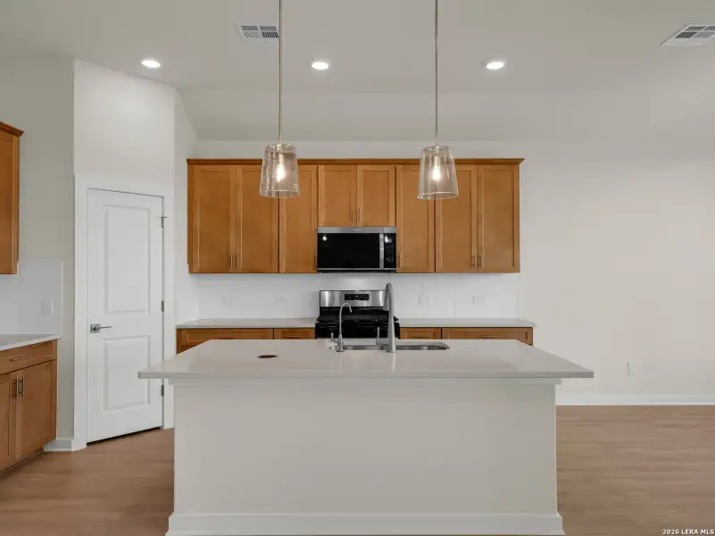 Furnished interior view inside a new home in Comanche Ridge, San Antonio (Image 7).