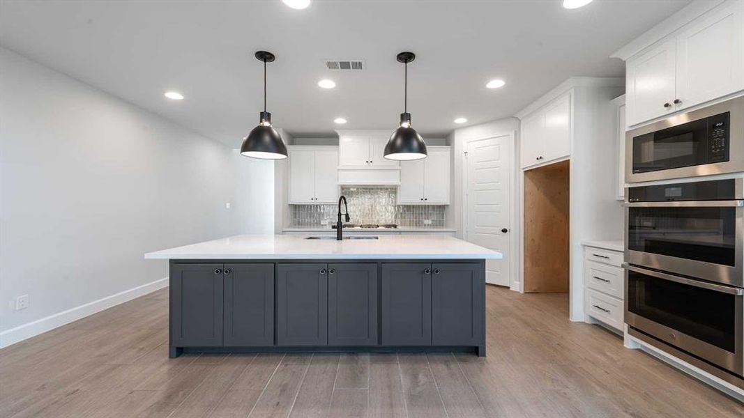 Furnished interior view inside a new home in The Heights At Uptown Celina 50', Celina (Image 7).