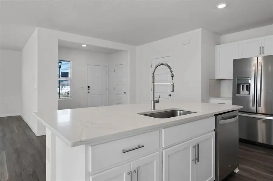 Furnished interior view inside a new home in Harmony at Lake Eloise, Winter Haven (Image 9). Furnished interior view inside a new home in Harmony at Lake Eloise, Winter Haven (Image 9).