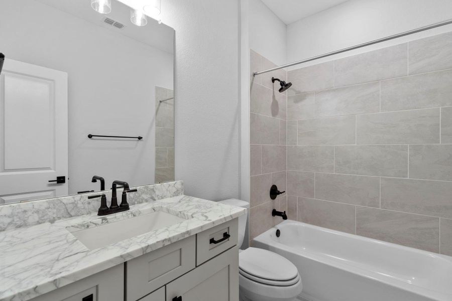 Granite counters in the upstairs baths.