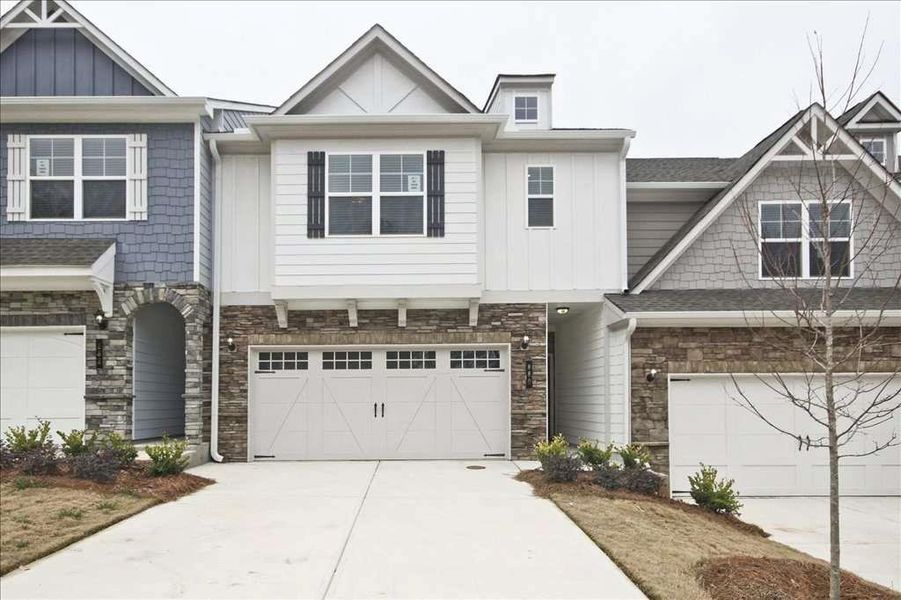 Front exterior of a new home in Porter Reserve, Decatur, GA, highlighting curb appeal (Image 1). Front exterior of a new home in Porter Reserve, Decatur, GA, highlighting curb appeal (Image 1).