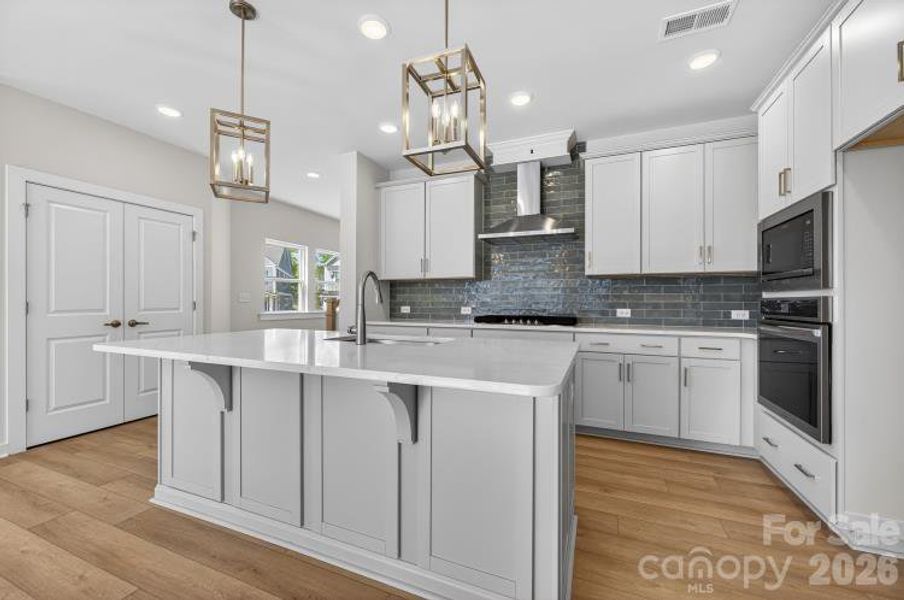 Furnished interior view inside a new home in North Creek Village - Townhomes, Huntersville (Image 9).