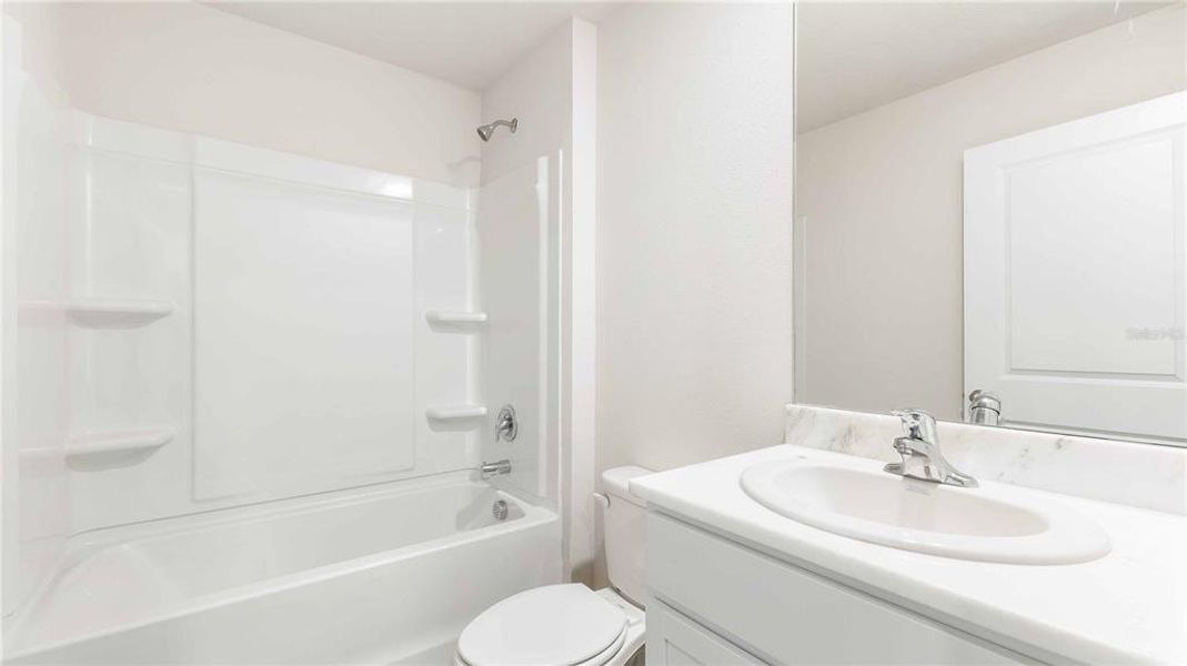 Furnished interior view inside a new home in Oakfield Lakes, Parrish (Image 4). Furnished interior view inside a new home in Oakfield Lakes, Parrish (Image 4).