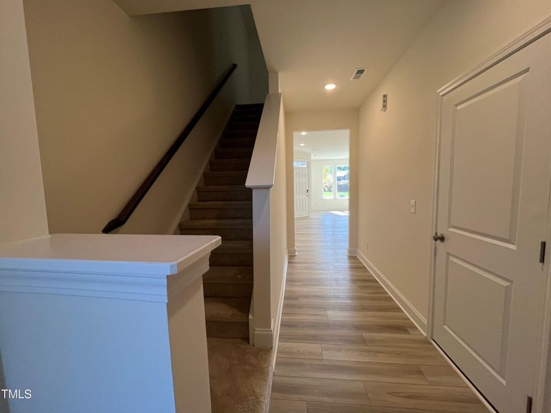 Foyer leading to back staircase