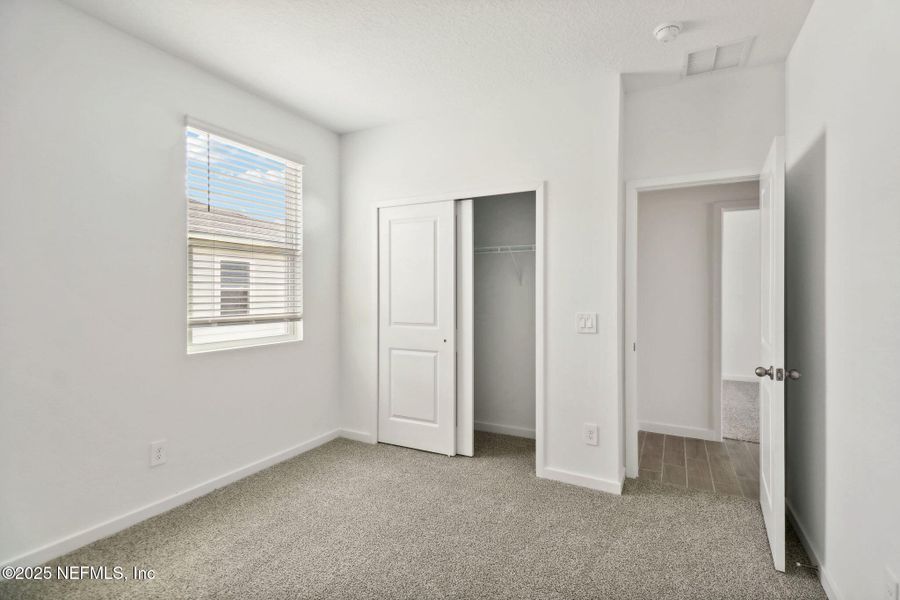 Spacious, unfurnished interior of a new home in Cypress Meadows - Signature Series, Jacksonville (Image 25).