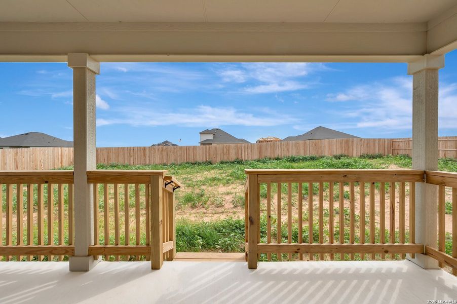 Exterior details and patio area of a home in Hickory Ridge Estates, Elmendorf (Image 4).