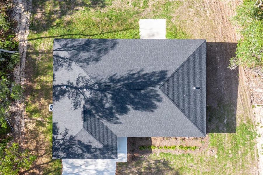 Front exterior of a new home in , Ocklawaha, FL, highlighting curb appeal (Image 2).