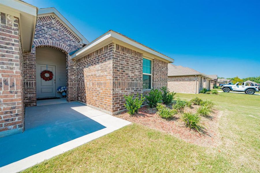 Front exterior of a new home in , Kaufman, TX, highlighting curb appeal (Image 2). Front exterior of a new home in , Kaufman, TX, highlighting curb appeal (Image 2).