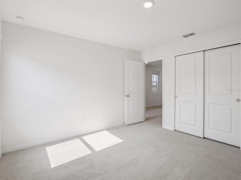 Spacious, unfurnished interior of a new home in Oakfield Trails - Premier Series, Parrish (Image 30).