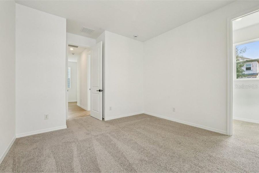 Spacious, unfurnished interior of a new home in Northlake Classical, Winter Garden (Image 26).