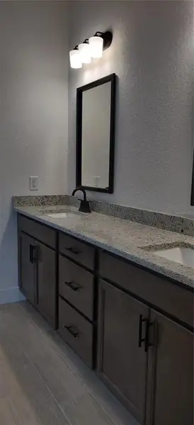 Furnished interior view inside a new home in Sunset Landing, Spring Hill (Image 5).