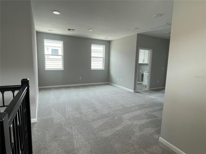 Spacious, unfurnished interior of a new home in Center Lake on the Park, St. Cloud (Image 55).