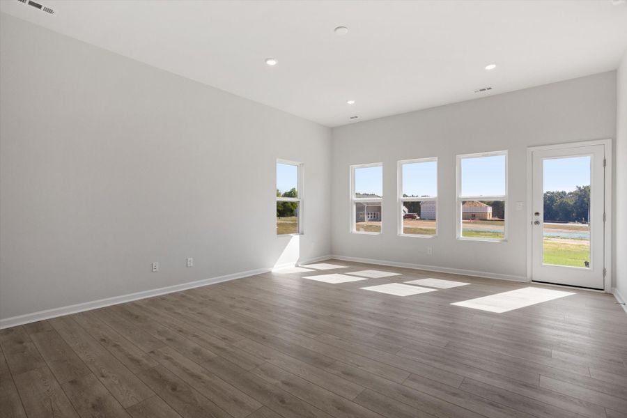 Spacious, unfurnished interior of a new home in Cambridge Reserve, Angier (Image 15).