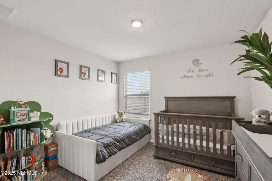 Furnished interior view inside a new home in Cross Creek Express, Green Cove Springs (Image 11).
