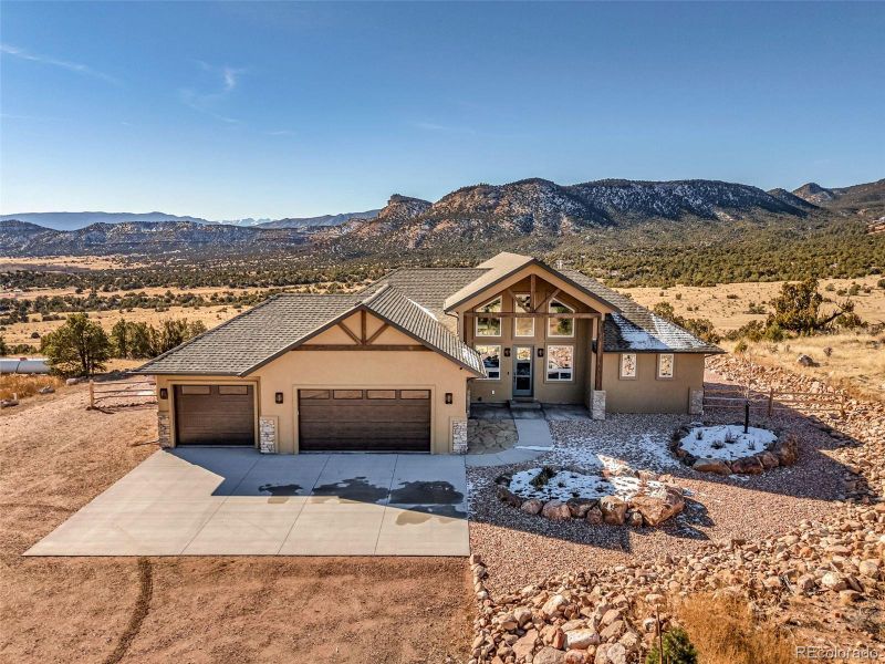 Front exterior of a new home in , Cañon City, CO, highlighting curb appeal (Image 25). Front exterior of a new home in , Cañon City, CO, highlighting curb appeal (Image 25).
