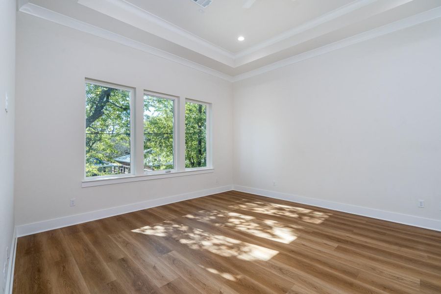 The large windows in this third bedroom allow for plenty of natural light to enter making this a cozy and warm living space. The large windows in this third bedroom allow for plenty of natural light to enter making this a cozy and warm living space.
