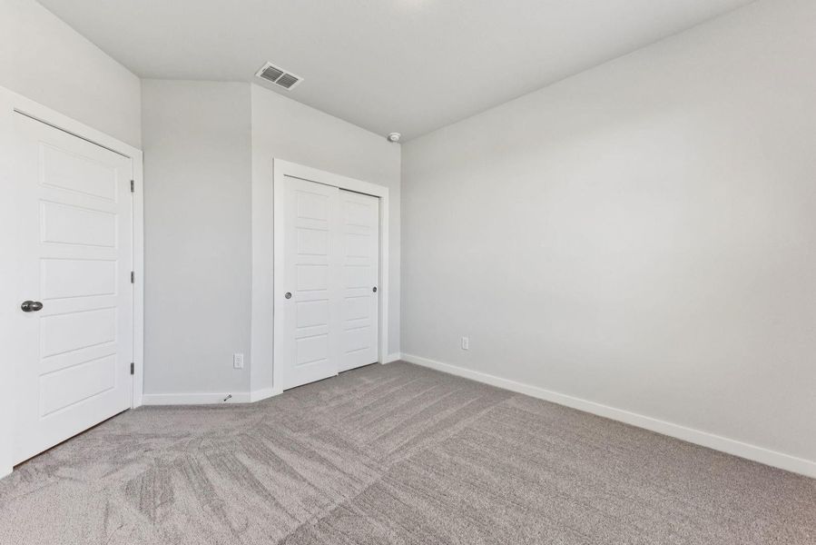 Spacious, unfurnished interior of a new home in The Glen at Stallion Run, Buda (Image 21).