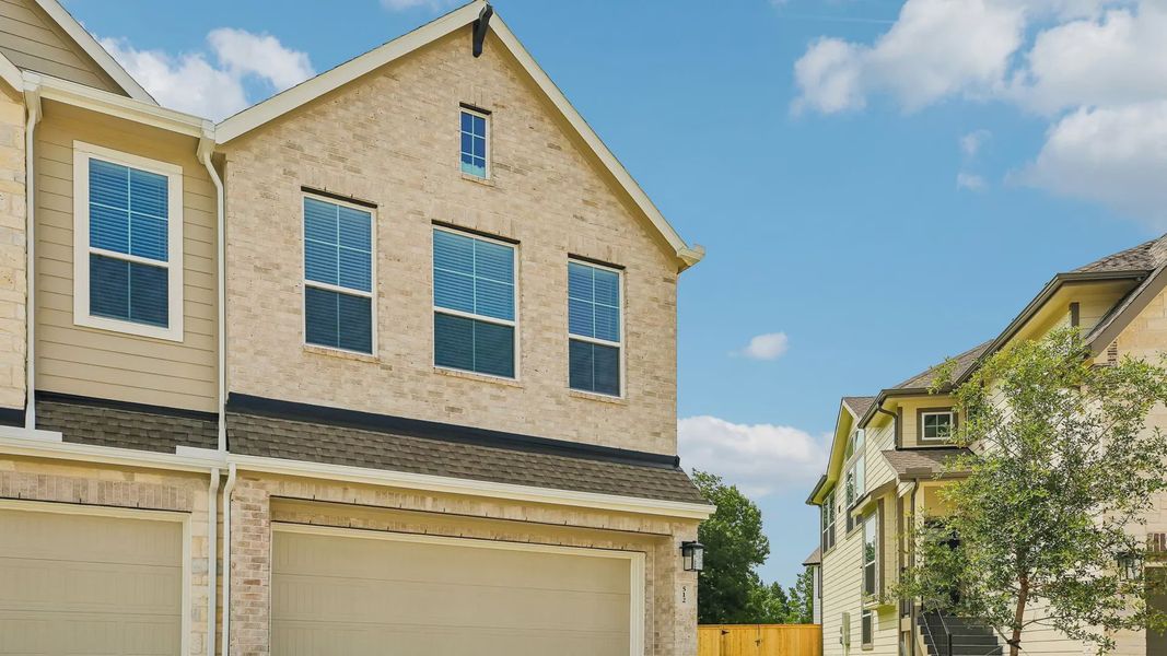 Front exterior of a new home in Woodforest, Montgomery, TX, highlighting curb appeal (Image 19). Front exterior of a new home in Woodforest, Montgomery, TX, highlighting curb appeal (Image 19).