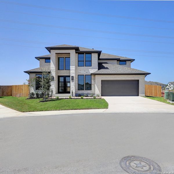 Front exterior of a new home in Haby Hill, San Antonio, TX, highlighting curb appeal (Image 2). Front exterior of a new home in Haby Hill, San Antonio, TX, highlighting curb appeal (Image 2).